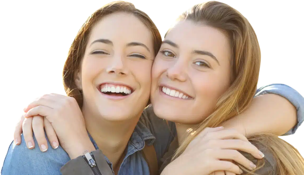 Two Girl smiling together.